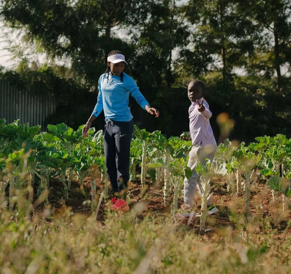 Faith Kipyegon and her daughter, Allyn